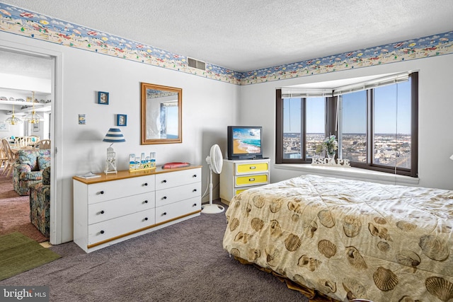 9400 Coastal Hwy Unit 1901, Ocean City, MD 21842 - carpeted bedroom featuring visible vents and a textured ceiling