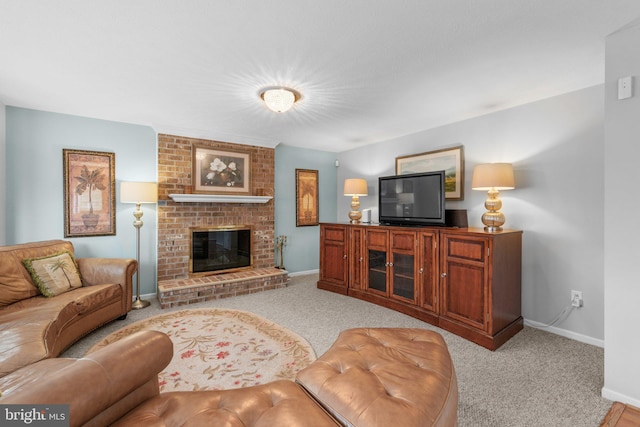 carpeted living room with baseboards and a fireplace