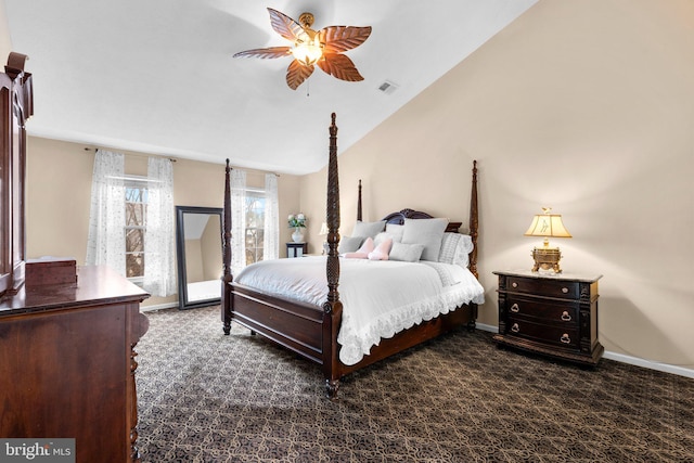 carpeted bedroom with vaulted ceiling, baseboards, visible vents, and ceiling fan