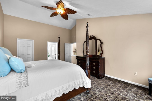 bedroom featuring visible vents, lofted ceiling, dark carpet, baseboards, and ceiling fan