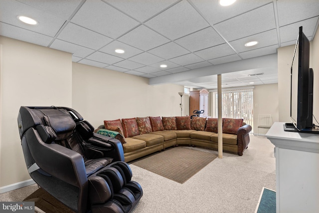 living area featuring recessed lighting, baseboards, a paneled ceiling, and carpet