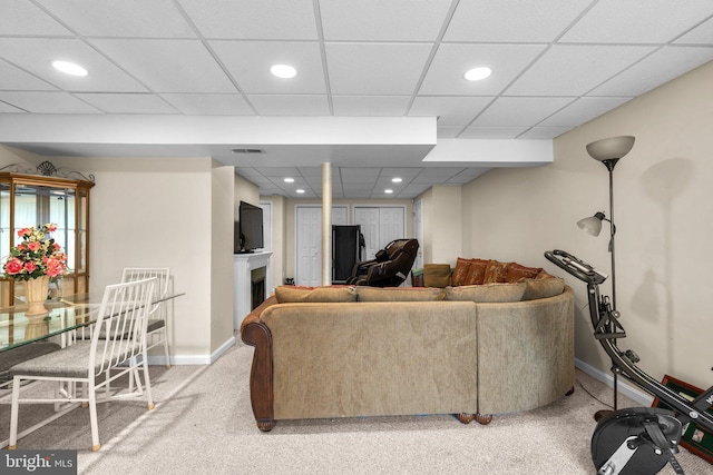 living room with visible vents, baseboards, carpet flooring, recessed lighting, and a fireplace