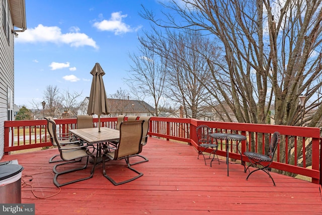 deck with outdoor dining space