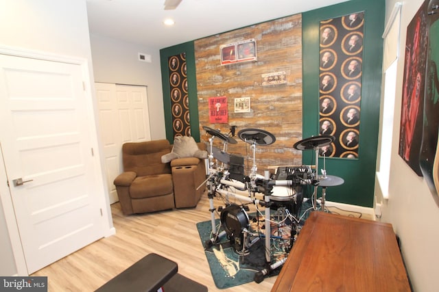 playroom featuring recessed lighting and wood finished floors