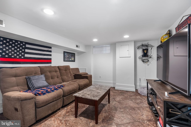 living area with visible vents, recessed lighting, and baseboards