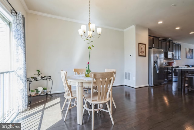 dining space with a notable chandelier, dark wood-style floors, baseboards, and a wealth of natural light
