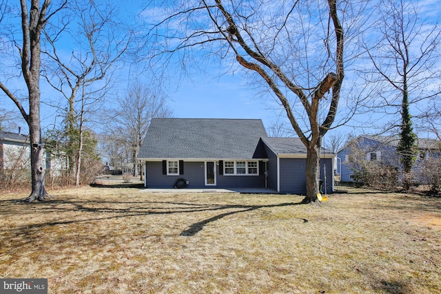 view of front facade with a shingled roof