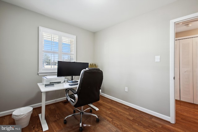 office with baseboards and wood finished floors