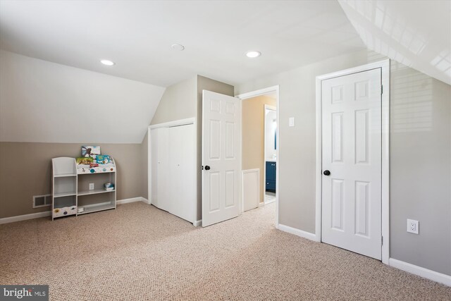 bonus room featuring visible vents, light carpet, lofted ceiling, recessed lighting, and baseboards