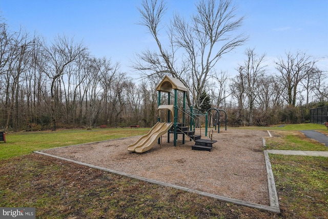 community playground featuring a yard