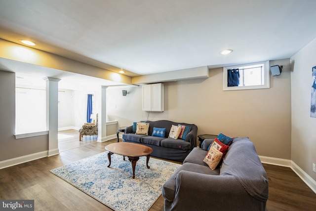 living room featuring recessed lighting, wood finished floors, and baseboards