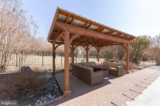 view of patio / terrace with outdoor lounge area and fence