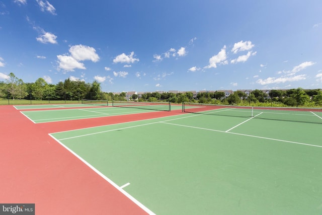 view of sport court featuring community basketball court and fence