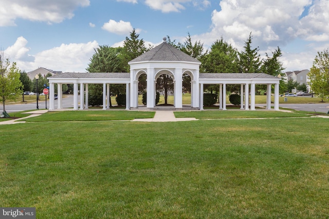 surrounding community featuring a gazebo and a lawn