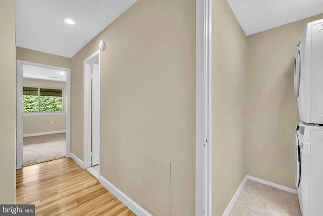 9920 Walker House Rd Unit 5, Gaithersburg, MD 20886 - hall featuring estacked washer and dryer, baseboards, and recessed lighting