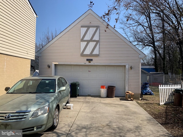 detached garage with fence