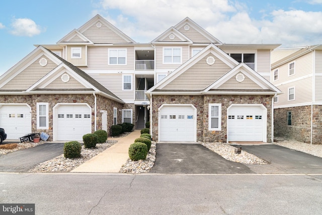 4101D Fullerton Ct, Milford, DE 19963 - multi unit property with aphalt driveway, a garage, and stone siding