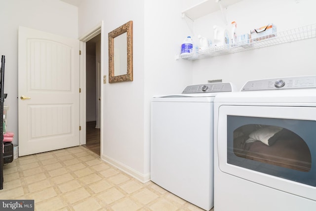4101D Fullerton Ct, Milford, DE 19963 - laundry room with laundry area, light floors, baseboards, and washer and clothes dryer