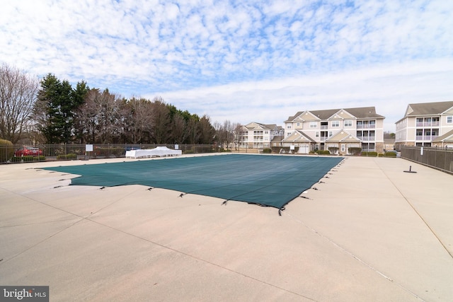 4101D Fullerton Ct, Milford, DE 19963 - community pool with a patio area, fence, and a residential view