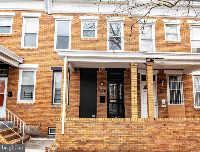 view of front of home with brick siding