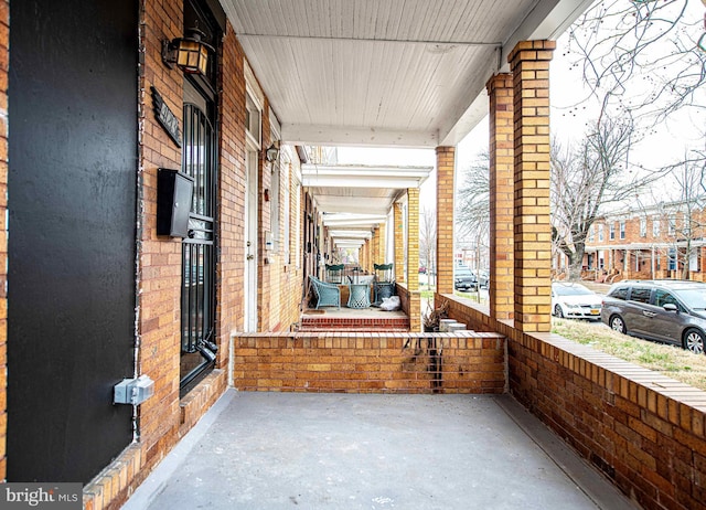 view of patio featuring covered porch