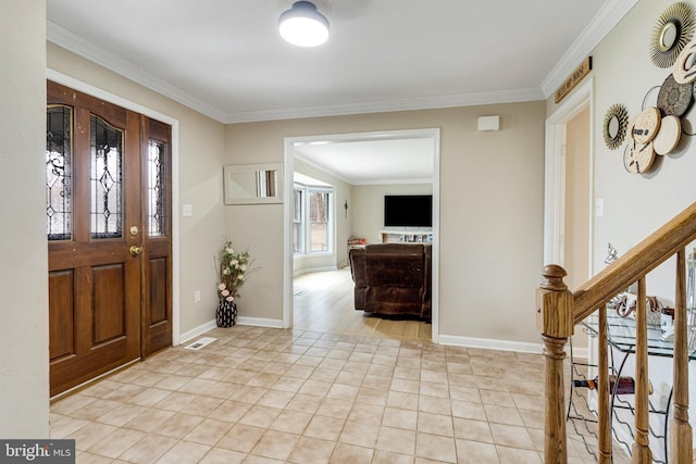 foyer entrance featuring light tile patterned floors, baseboards, and ornamental molding