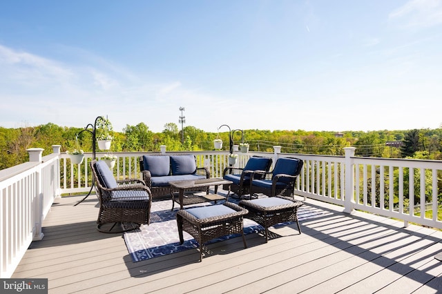 wooden deck with outdoor lounge area