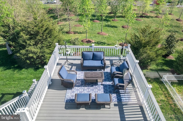 wooden terrace with an outdoor hangout area