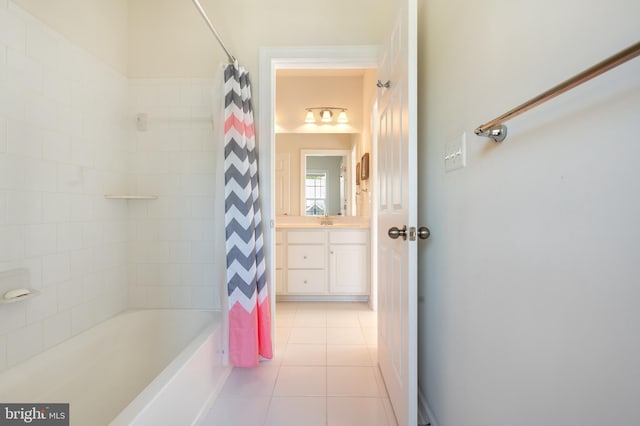 full bathroom with tile patterned floors, shower / tub combo, and vanity