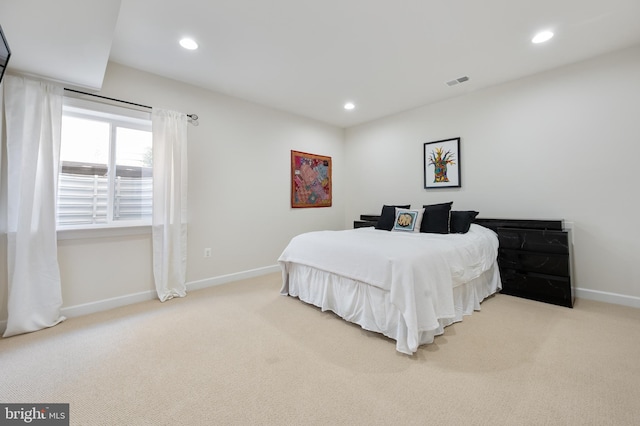 bedroom featuring visible vents, carpet, and recessed lighting