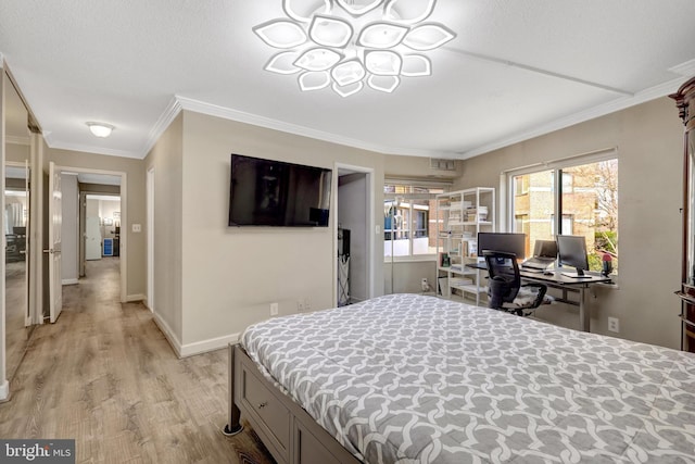 bedroom with light wood-type flooring, baseboards, a chandelier, and crown molding