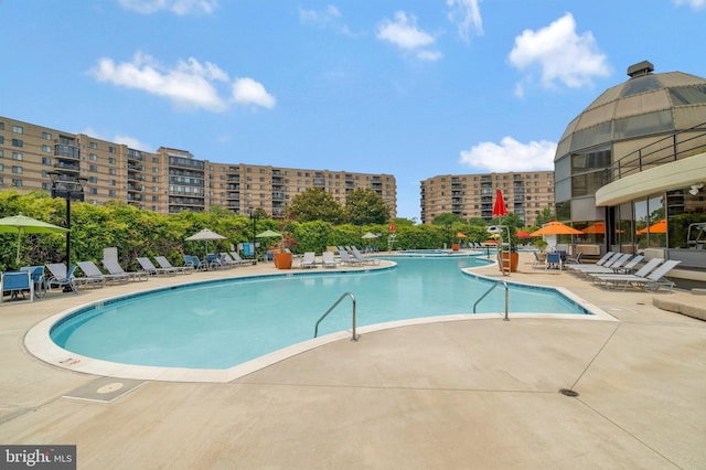 pool with a patio area