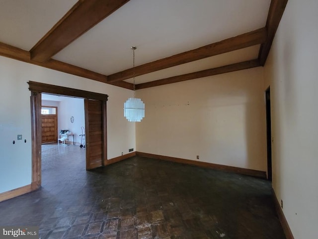 unfurnished room with beam ceiling, baseboards, and a chandelier