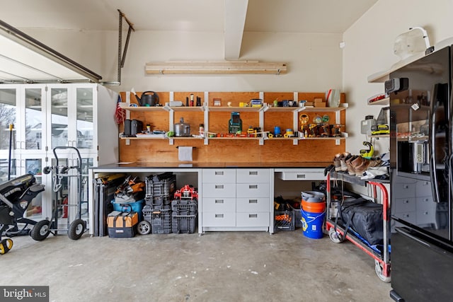 garage featuring a workshop area