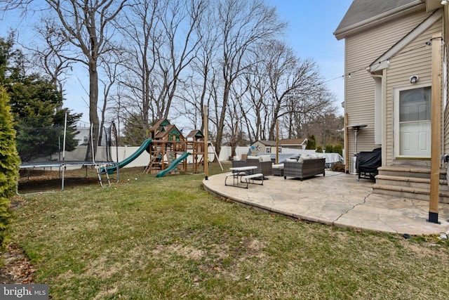 view of yard featuring entry steps, a playground, a trampoline, a patio area, and an outdoor hangout area