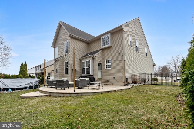 back of property with fence, a lawn, outdoor lounge area, and a patio area