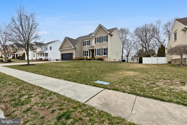 traditional home featuring stucco siding, fence, a residential view, an attached garage, and a front yard