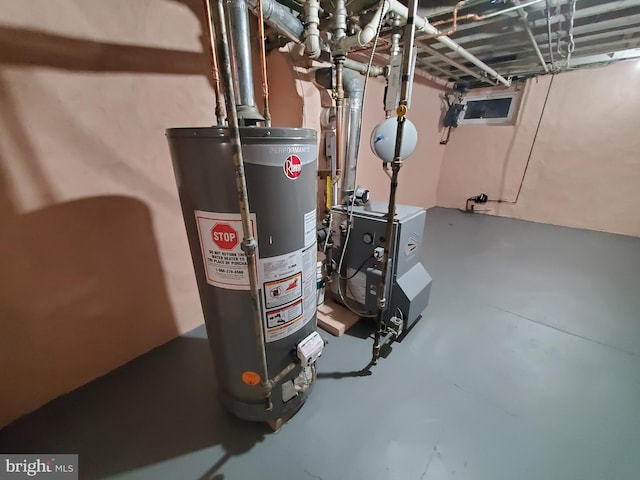 utilities featuring gas water heater and a heating unit