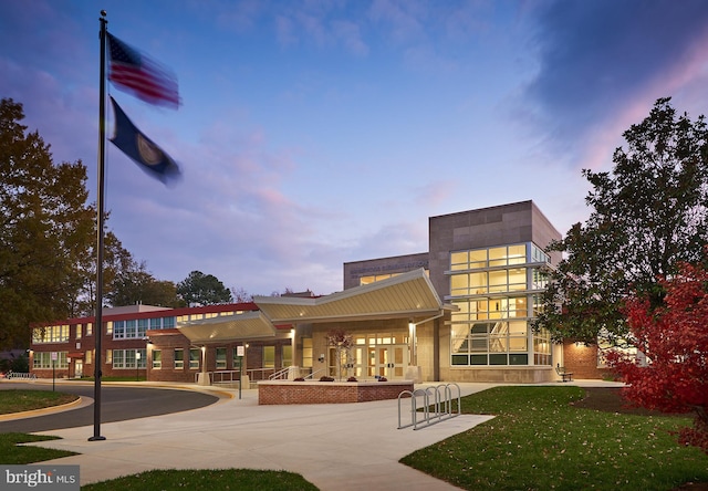 view of property at dusk