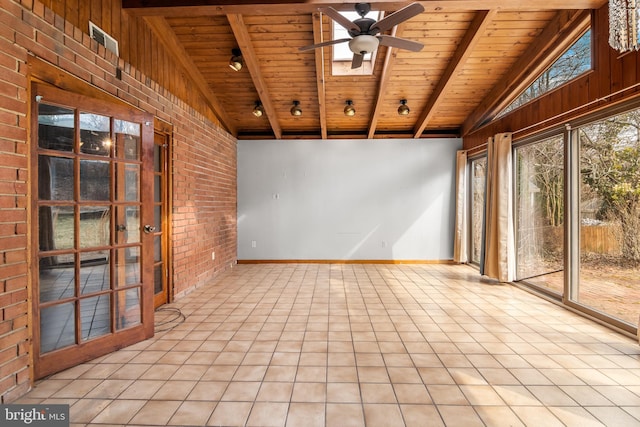 unfurnished sunroom with ceiling fan, wooden ceiling, and vaulted ceiling with beams