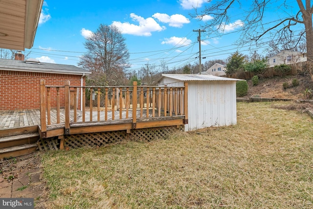 view of yard with a wooden deck and fence