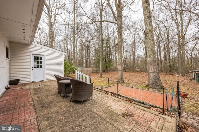 view of patio / terrace with fence