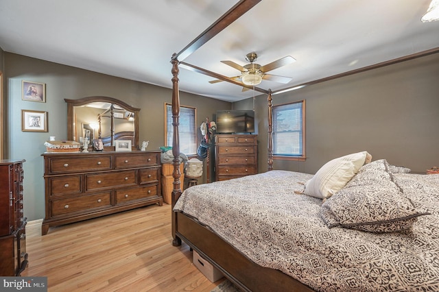 bedroom featuring a ceiling fan and light wood finished floors