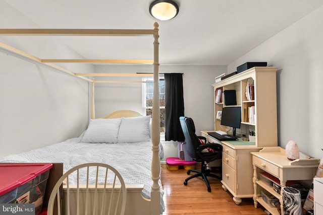 bedroom featuring light wood-type flooring