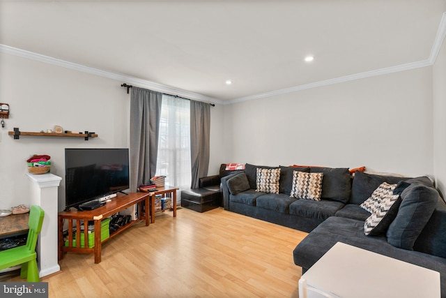 living room with recessed lighting, wood finished floors, and ornamental molding