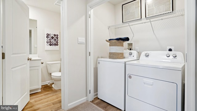 2 Anna Ln, Westampton, NJ 08060 - laundry room with washing machine and clothes dryer, visible vents, light wood finished floors, and laundry area