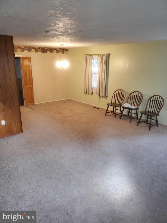 sitting room featuring carpet