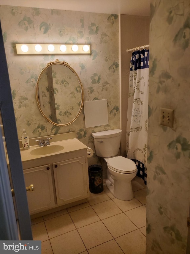 full bath featuring tile patterned flooring, toilet, wallpapered walls, and vanity