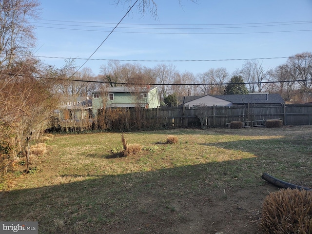 view of yard with fence