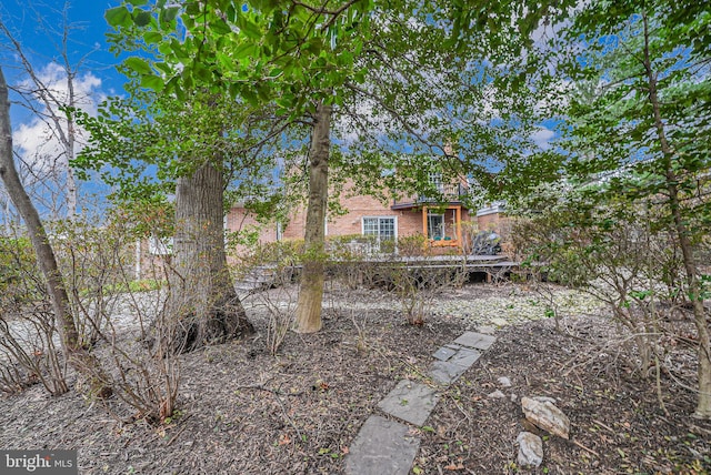 view of front of home featuring brick siding